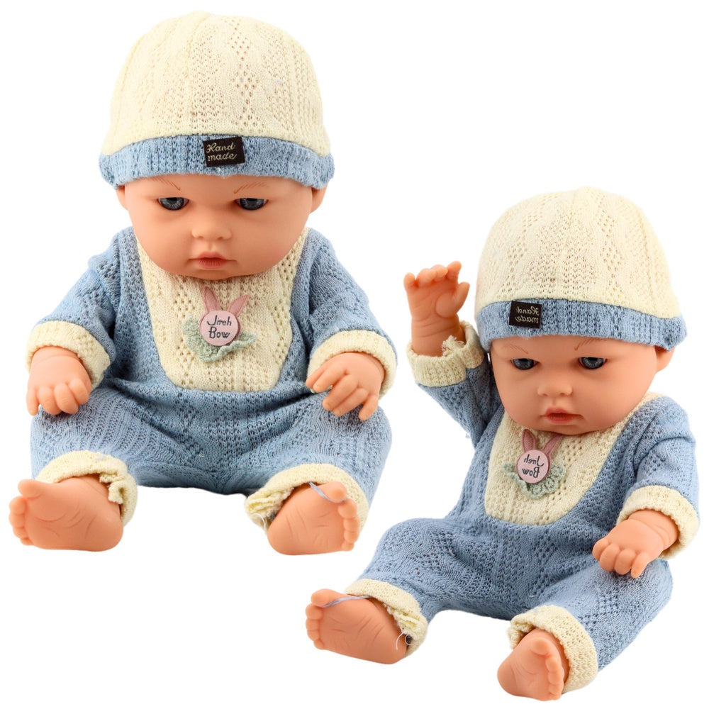 Babydocka 29 cm med stickad outfit och mössa, verklighetstrogen