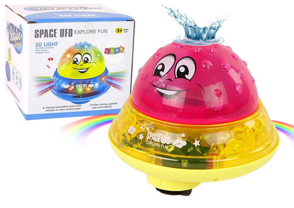 Badleksak UFO-boll med vattenfontän, musik & LED-ljus rosa 13 cm