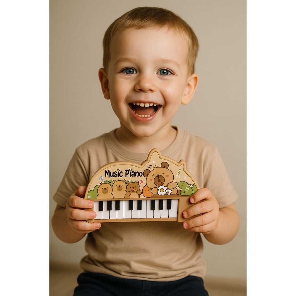 Barnpiano leksak 22 tangenter kapybara pastell, batteridrivet