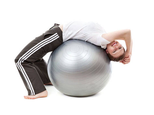 Gymnastikboll 65 cm röd PVC med pump för träning och rehab