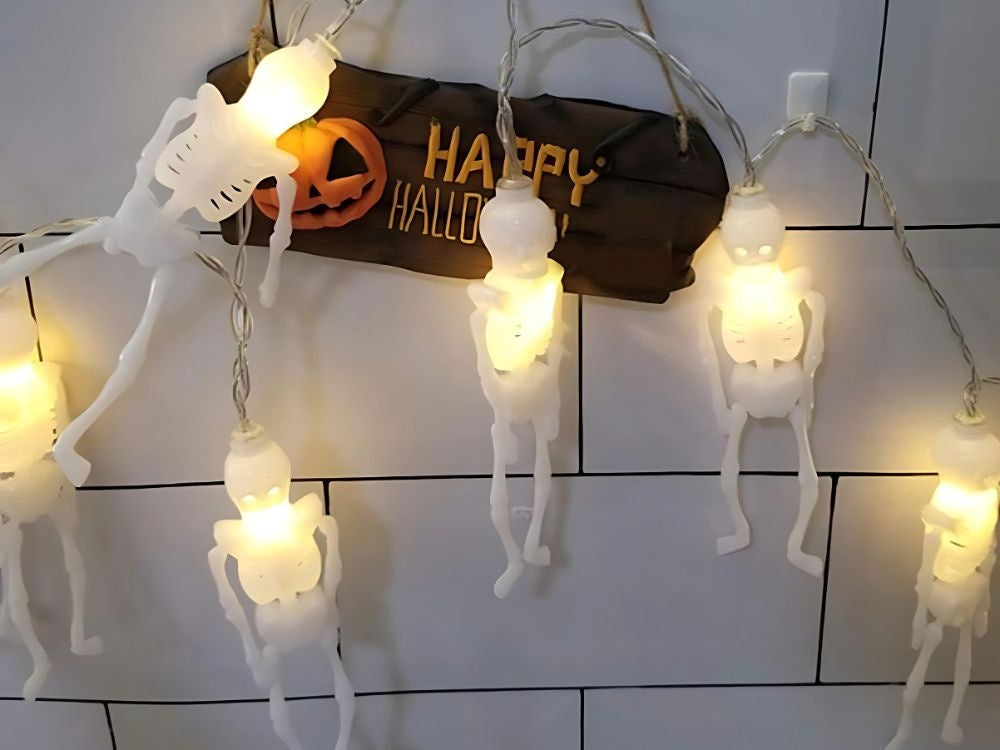 Halloween ljusslinga 2 m med 10 skelett LED varmvit batteridriven