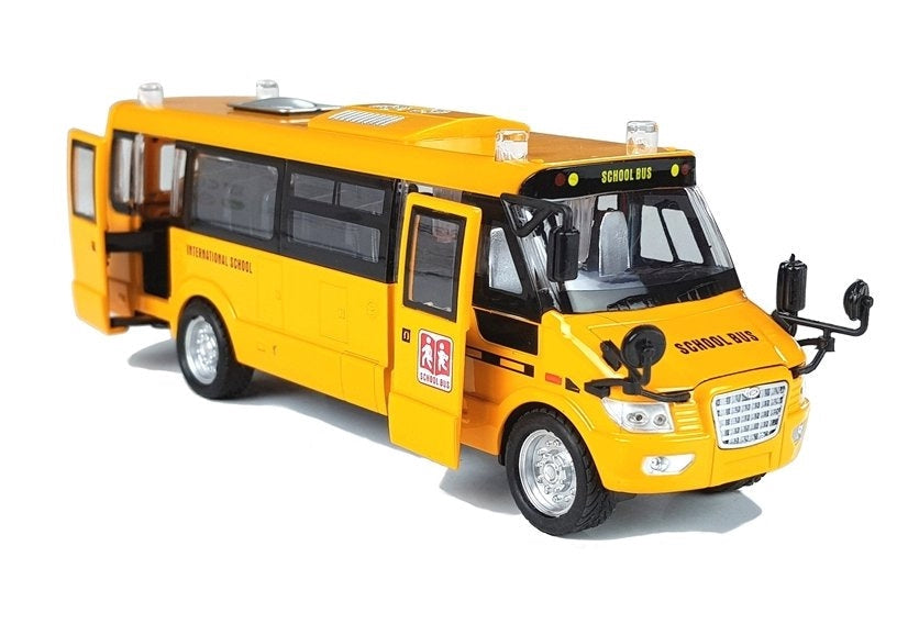 Leksaksbuss skolbuss i metall 23 cm med ljud/ljus och pull-back