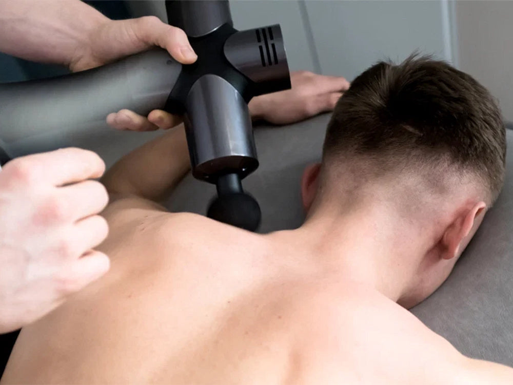 Massagepistol 30 hastigheter med 6 massagehuvuden och fodral