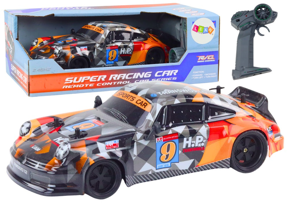 Radiostyrd bil 1:18 orange 2,4 GHz med gummihjul 23 cm