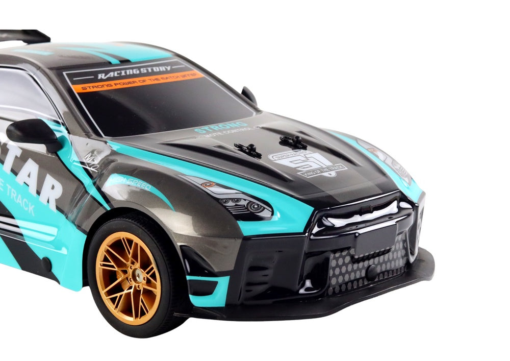 Radiostyrd sportbil 1:10 25 km/h 2.4G turkos/svart med 7.4V batteri