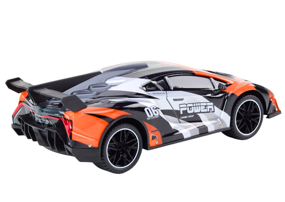 Radiostyrd sportbil 1:10 25 km/h grå/orange 42 cm