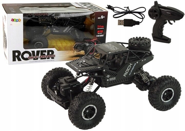 Radiostyrd terrängbil 1:16 svart 28 cm med fjärrkontroll USB-laddare
