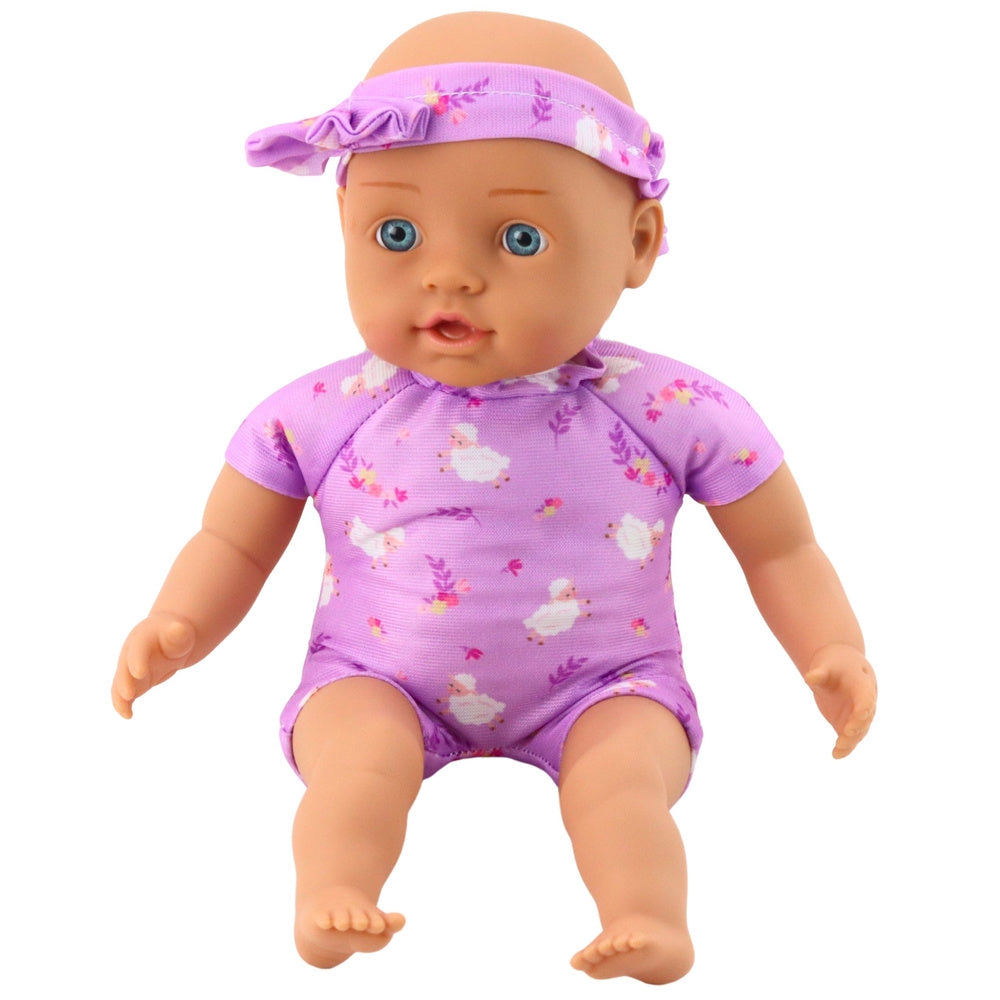 Babydocka 31 cm med lila bodysuit och huvudband