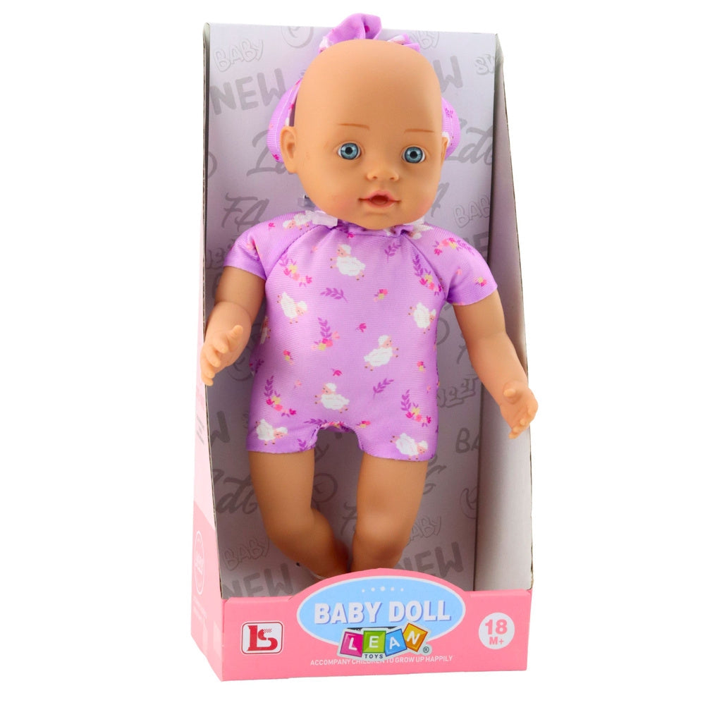 Babydocka 31 cm med lila bodysuit och huvudband