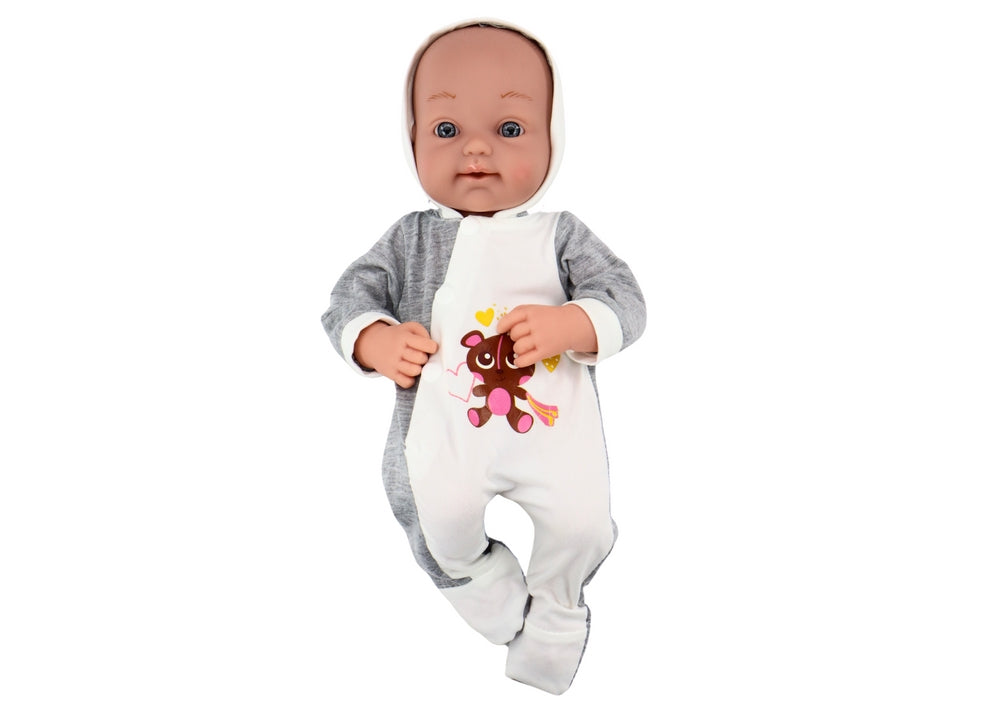 Babydocka 35 cm med rörliga armar/ben, napp på snöre och filt
