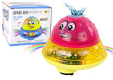 Badleksak UFO-boll med vattenfontän, musik & LED-ljus rosa 13 cm