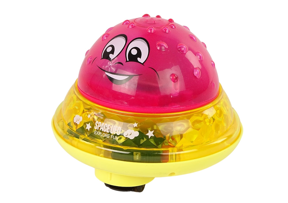 Badleksak UFO-boll med vattenfontän, musik & LED-ljus rosa 13 cm