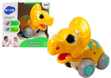 Dinosaurieleksak på hjul Triceratops gul 13 cm, från 18 mån
