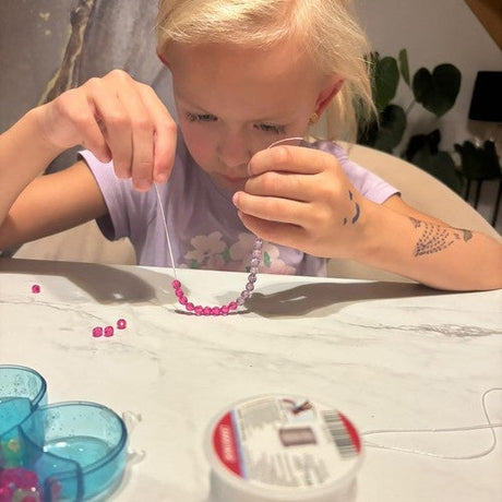 Elastiskt smyckesband 1 mm 40 m på rulle vit gummi