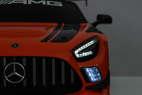 Elbil barn Mercedes AMG GT3 ride-on orange med fjärrkontroll 2.4G