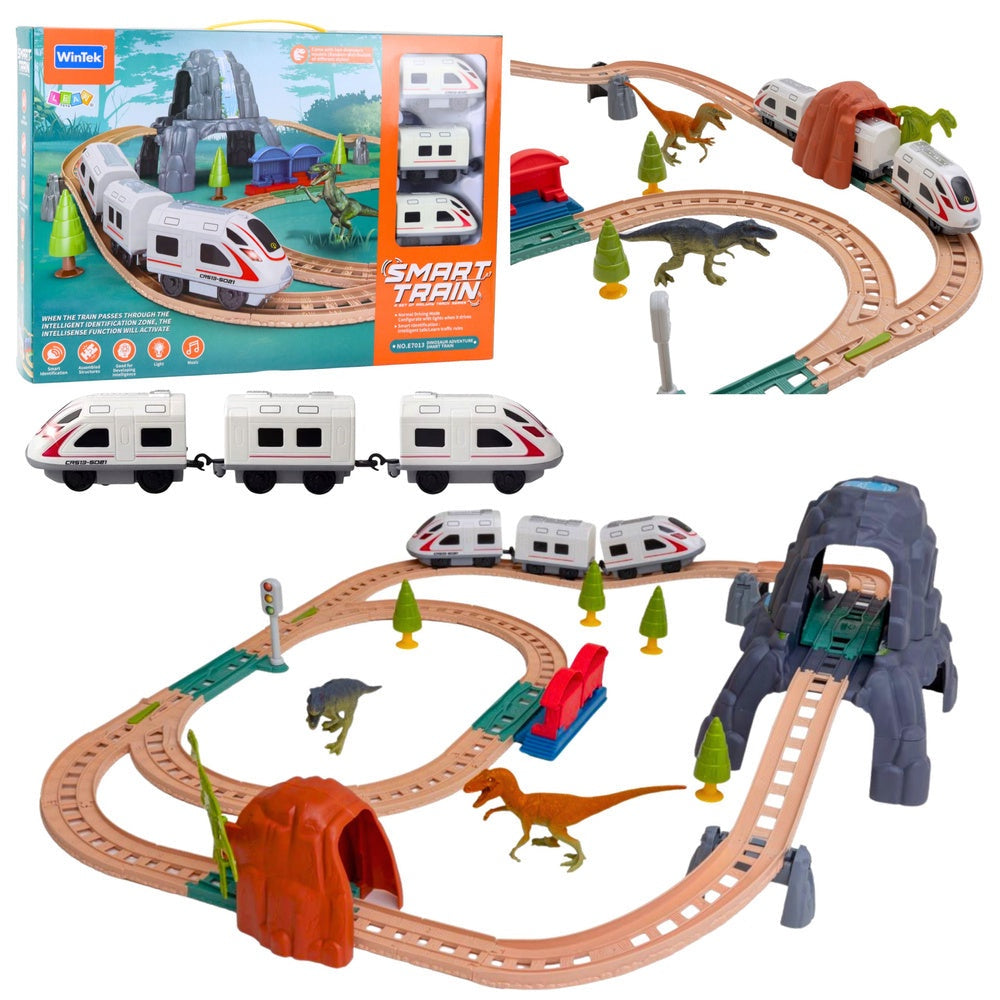 Elektriskt tågset dinosaurier med spår, tunnel, station, ljus & ljud