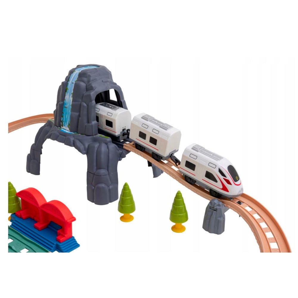 Elektriskt tågset dinosaurier med spår, tunnel, station, ljus & ljud