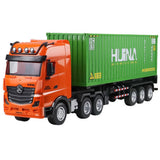 Fjärrstyrd TIR-lastbil med container 1:18 ljus/ljud 57 cm
