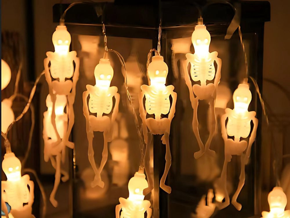 Halloween ljusslinga 2 m med 10 skelett LED varmvit batteridriven