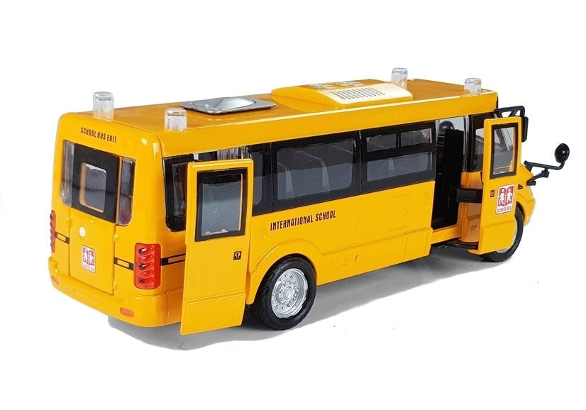 Leksaksbuss skolbuss i metall 23 cm med ljud/ljus och pull-back