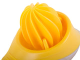Manuell citruspress i plast 50 ml gul 12,5x8 cm
