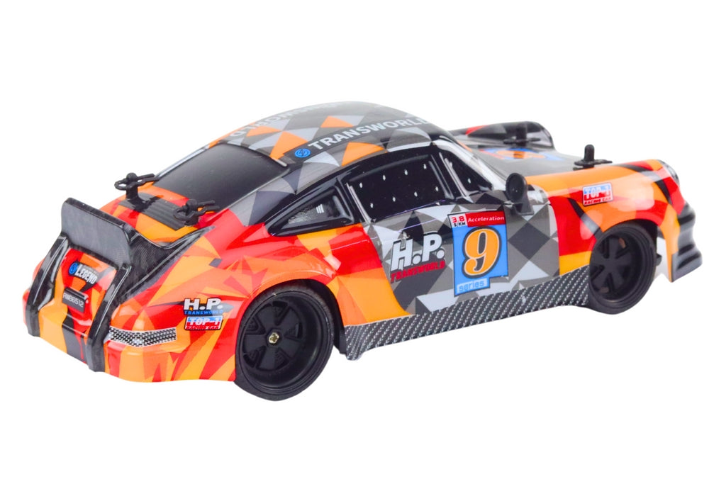 Radiostyrd bil 1:18 orange 2,4 GHz med gummihjul 23 cm