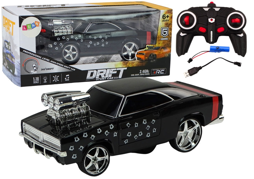 Radiostyrd driftbil 1:18 svart 2,4GHz med ljus/ljud + batteri/laddare