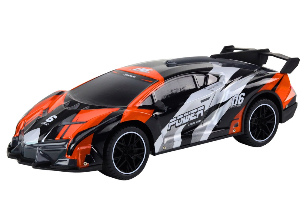 Radiostyrd sportbil 1:10 25 km/h grå/orange 42 cm