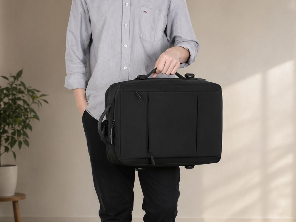 Reseryggsäck 50x36x23 cm med vakuumpump, vakuoficka & laptopfack, svart
