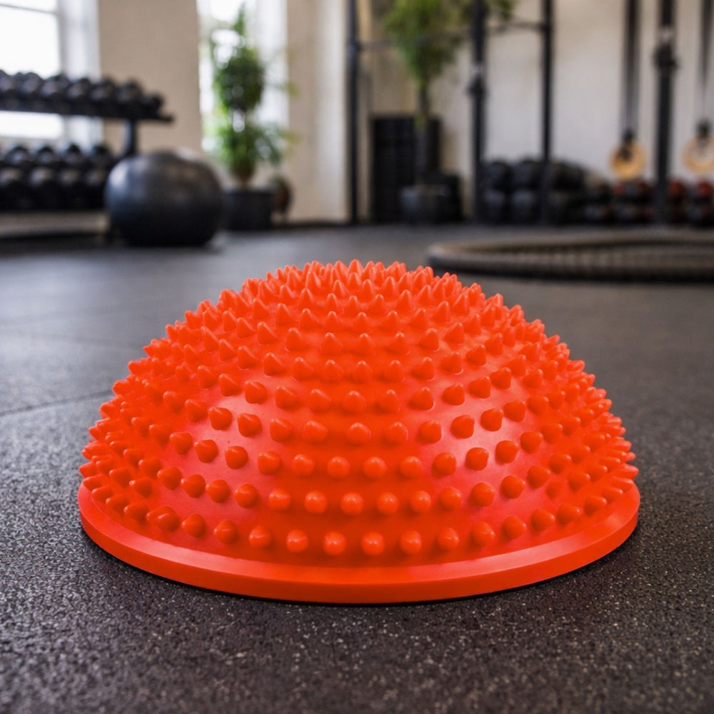 Sensorisk balanshalvboll 16 cm med massageknoppar orange