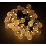 Solcells ljusslinga 7 m 50 LED varmvit IP65 8 lägen skymningssensor