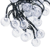 Solcells ljusslinga 7 m 50 LED varmvit IP65 8 lägen skymningssensor