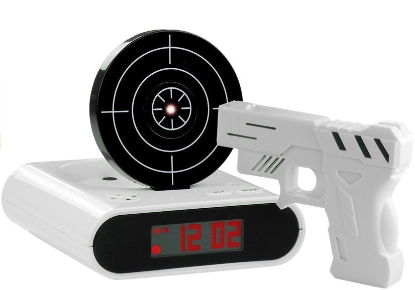 Väckarklocka med laserpistol och måltavla för att stänga av alarm